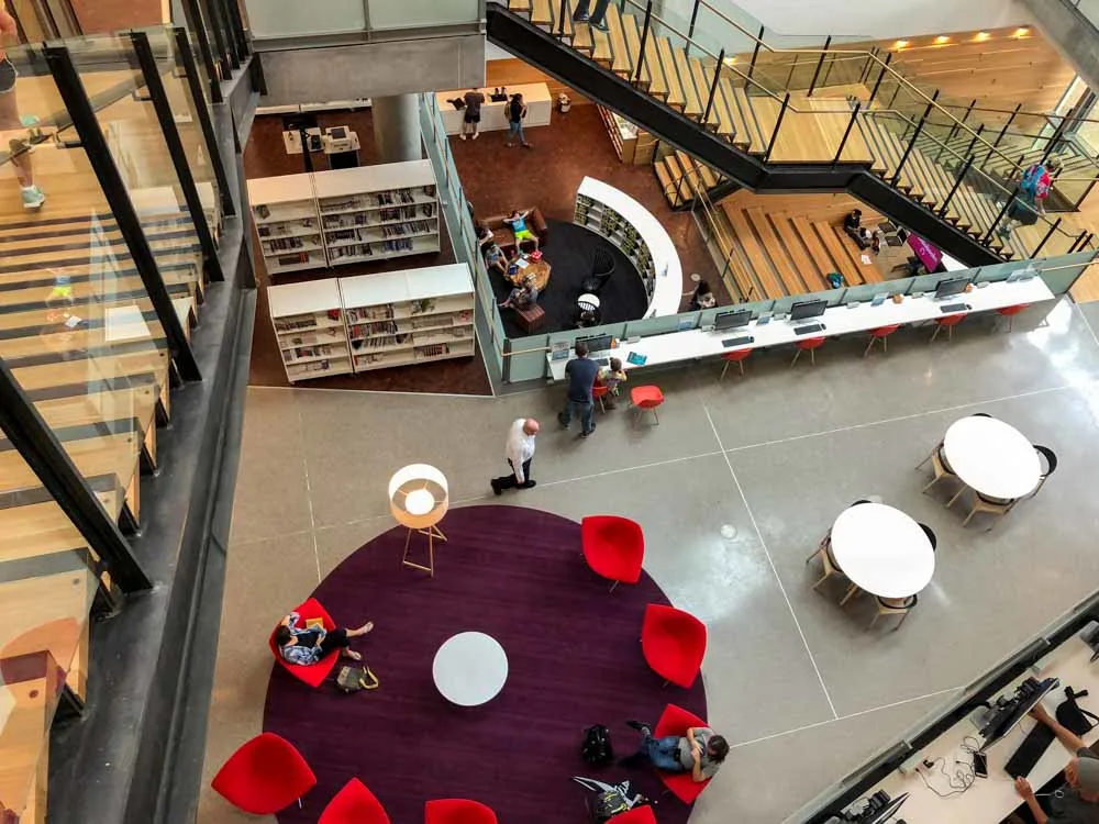 Austin Texas Central Library interior with chairs, stairs and shelves