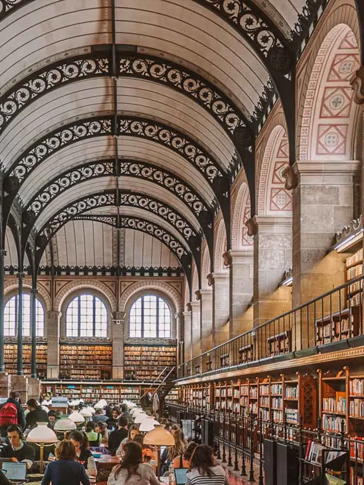 paris Sainte Genevieve library. Arched hall with bookshelves and work tables