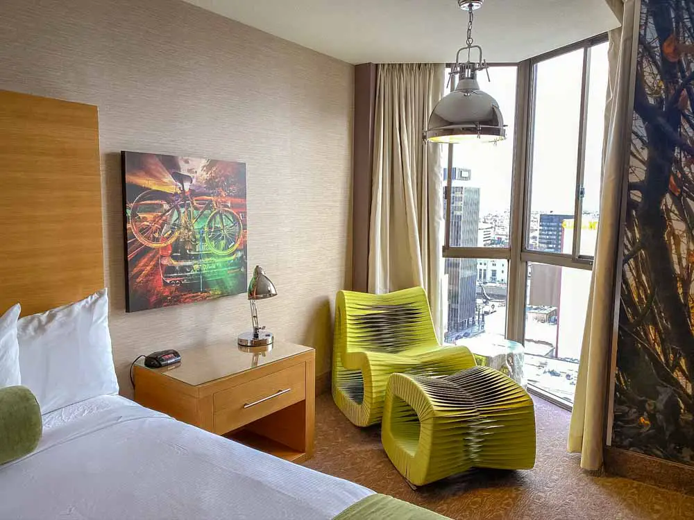 Whitney Peak Hotel room interior with green chair